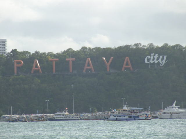 Archive photograph: Pattaya City sign on the wooded headland above Bali Hai