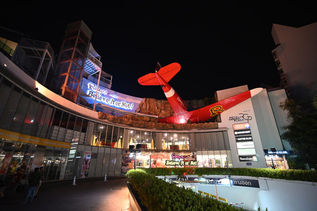 Archive photograph: The red airplane and illuminated Ripley’s signs at Royal Garden Plaza Pattaya at night