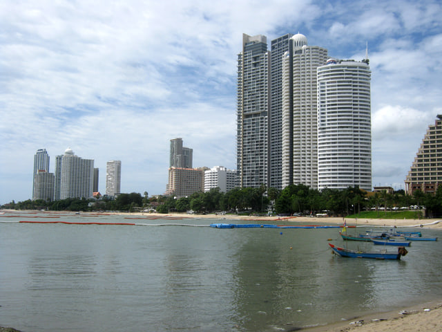 Archive photograph: Wong Amat Beach, boats and coastal buildings in an archive photograph
